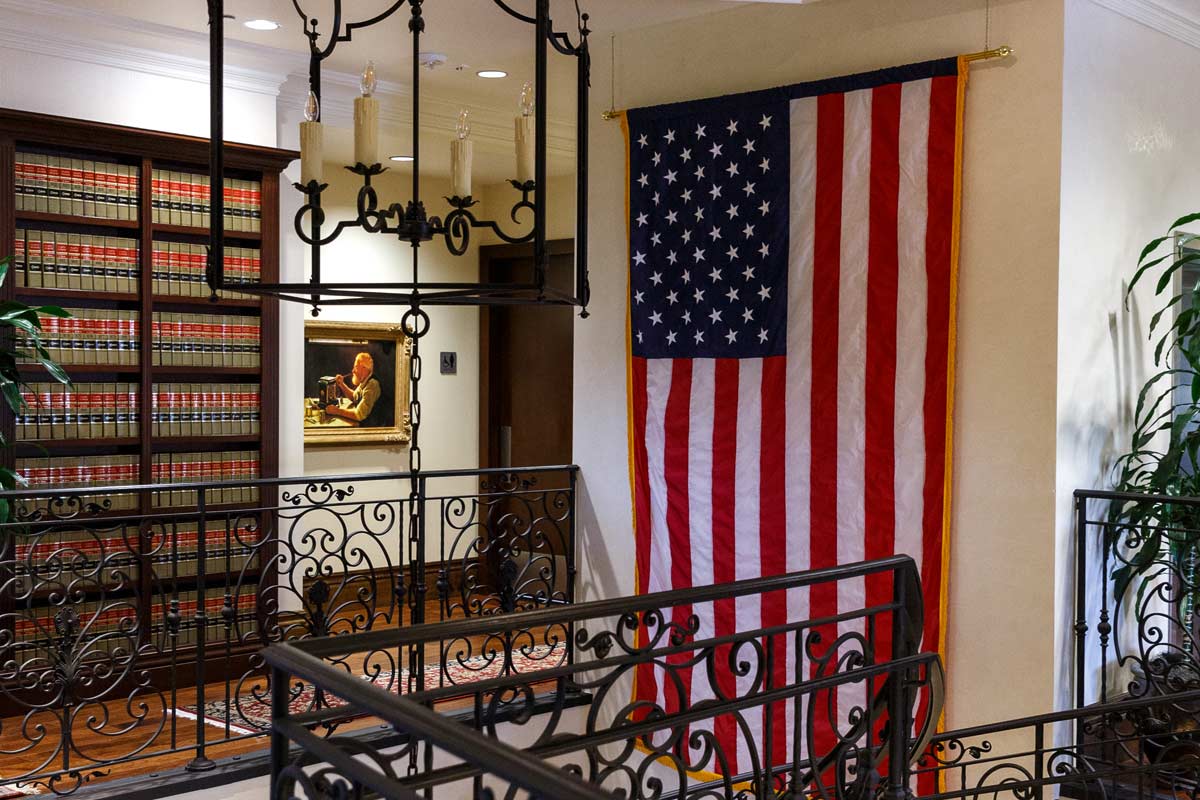 USA Flag at the top of the Gilbert Blilie staircase